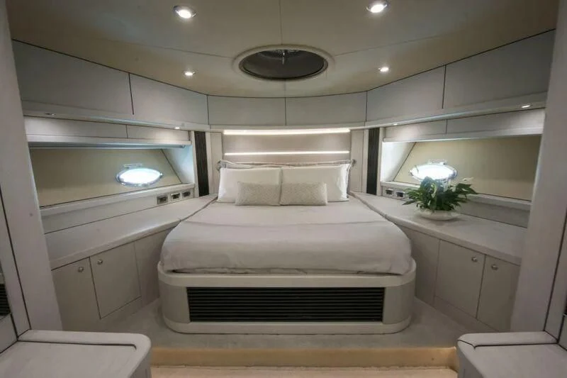 a white bed in a room aboard LIGHT BLUE Yacht for Sale