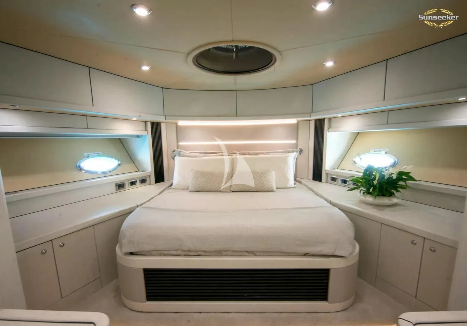 a white bed in a room aboard LIGHT BLUE Yacht for Sale