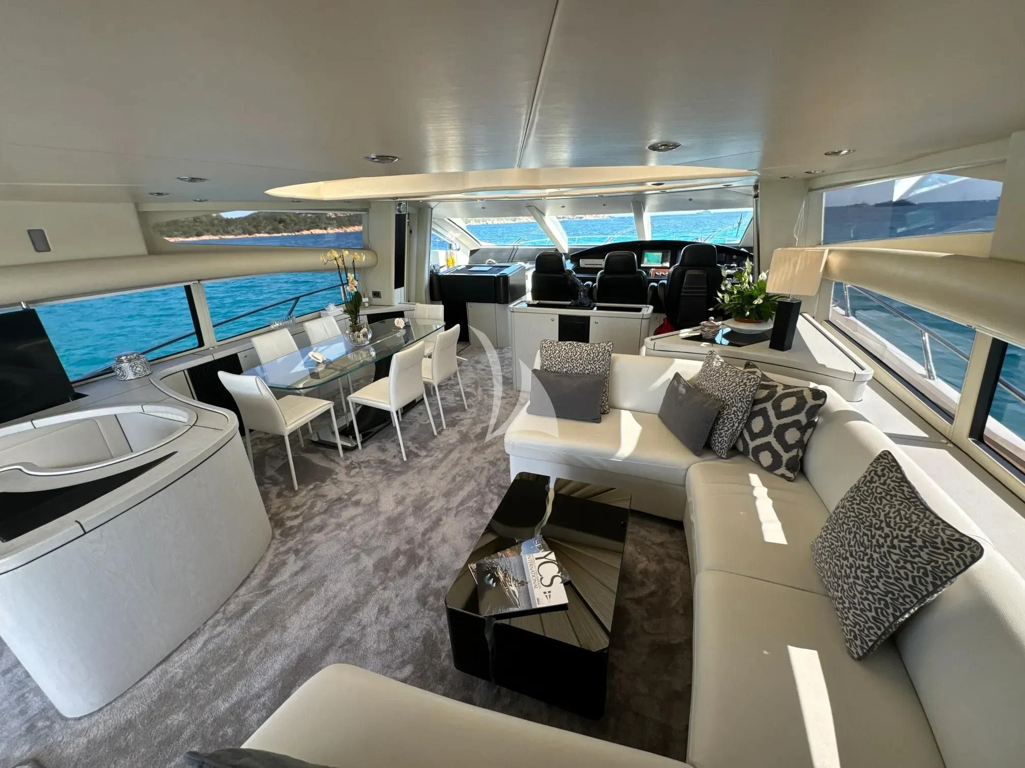 a living room with a large window aboard LIGHT BLUE Yacht for Sale