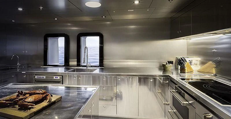 a kitchen with a large countertop aboard THE BEAST Yacht for Sale