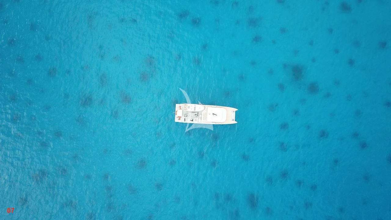 a small white object on a blue surface aboard THE BEAST Yacht for Sale