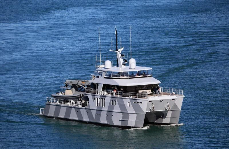 a large white boat in the water aboard THE BEAST Yacht for Sale