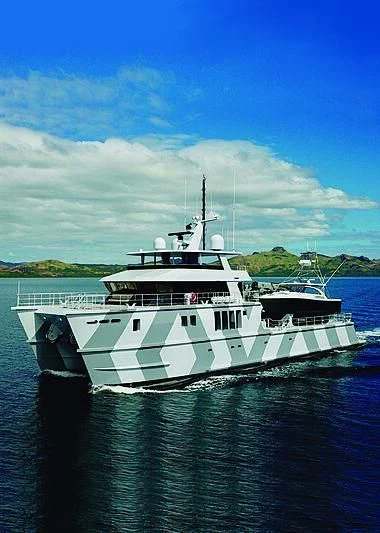 a white boat on water aboard THE BEAST Yacht for Sale