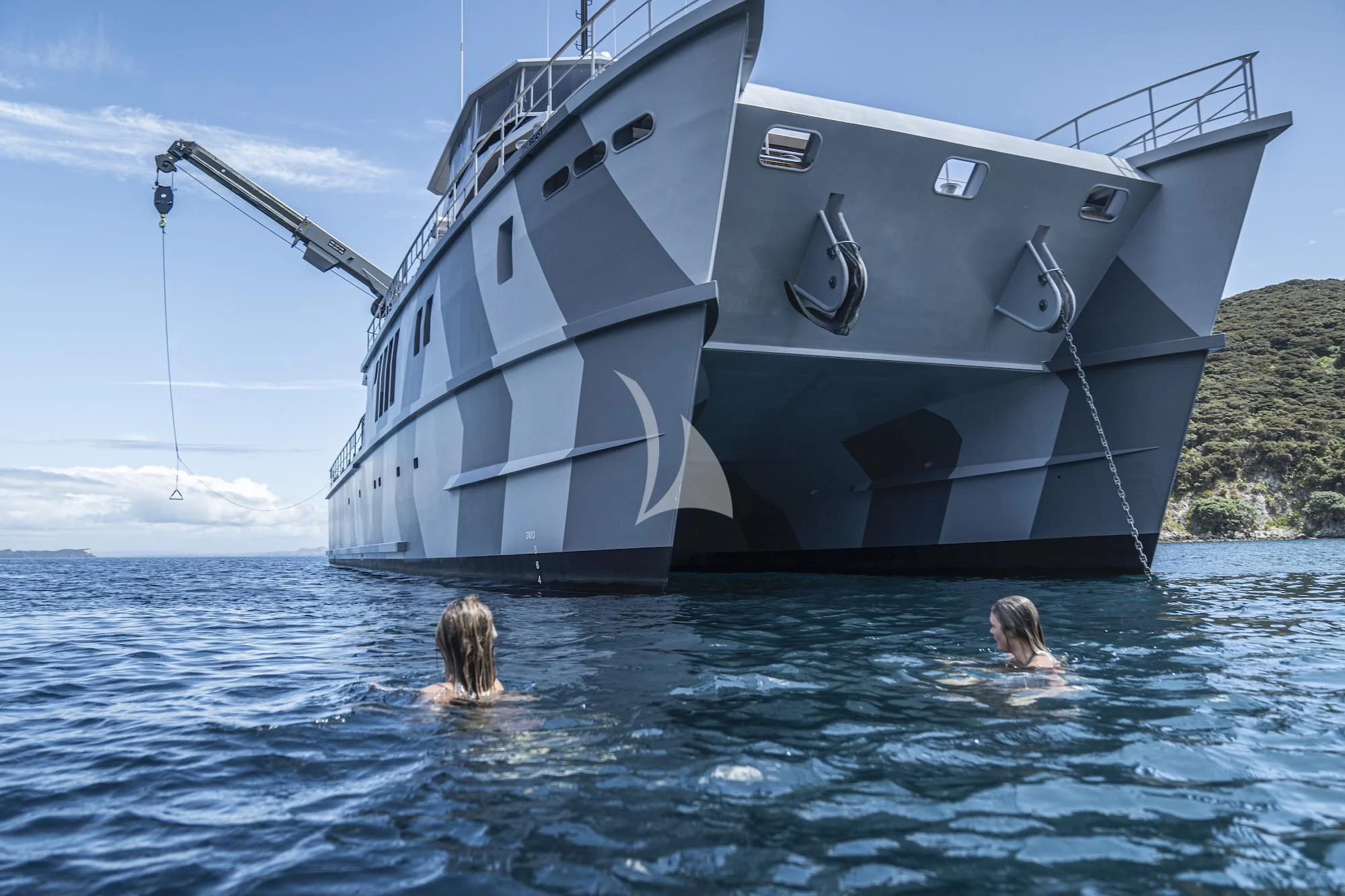 a large white boat in the water aboard THE BEAST Yacht for Sale
