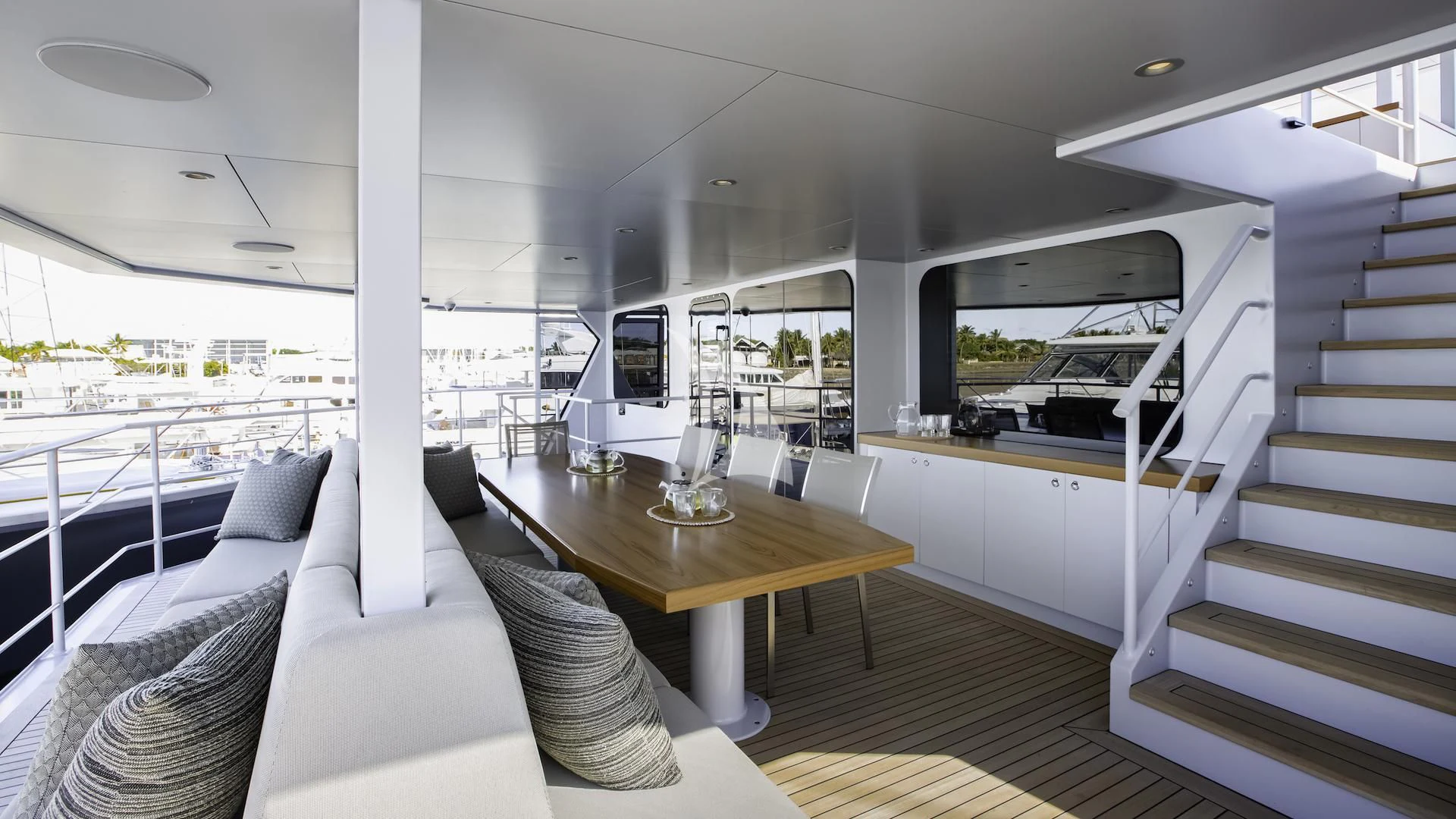 a room with a couch and a table aboard THE BEAST Yacht for Sale