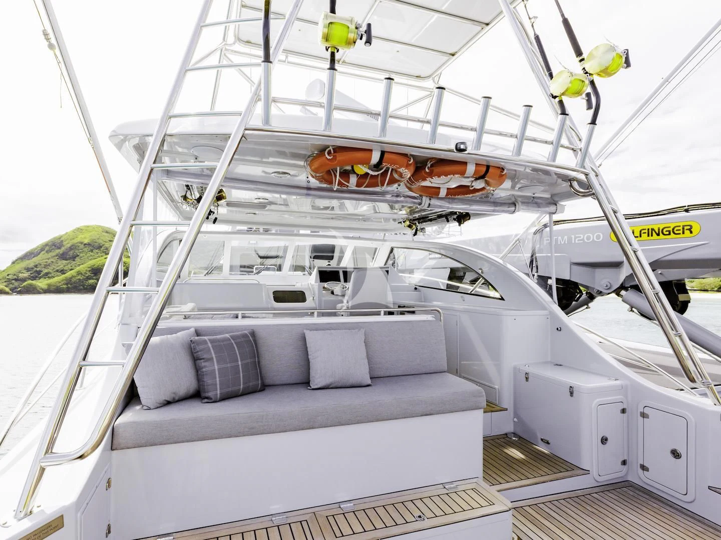 a boat with a couch aboard THE BEAST Yacht for Sale