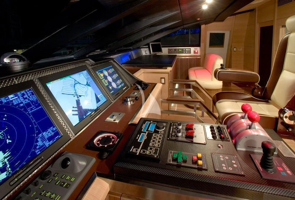 a room with a desk and computer aboard WAVERUNNER Yacht for Sale
