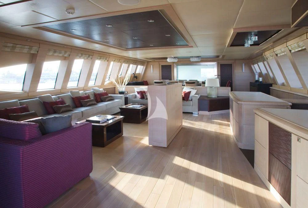 a large room with a wood floor aboard WAVERUNNER Yacht for Sale