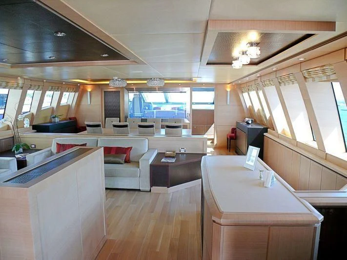 a room with a large desk and a large window aboard WAVERUNNER Yacht for Sale