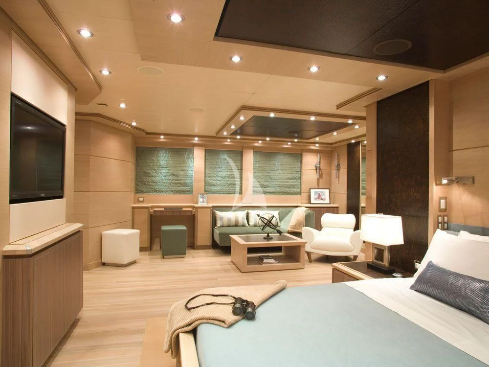 a room with a bed and a tv aboard WAVERUNNER Yacht for Sale