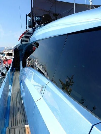 a large boat with a large boat aboard WAVERUNNER Yacht for Sale