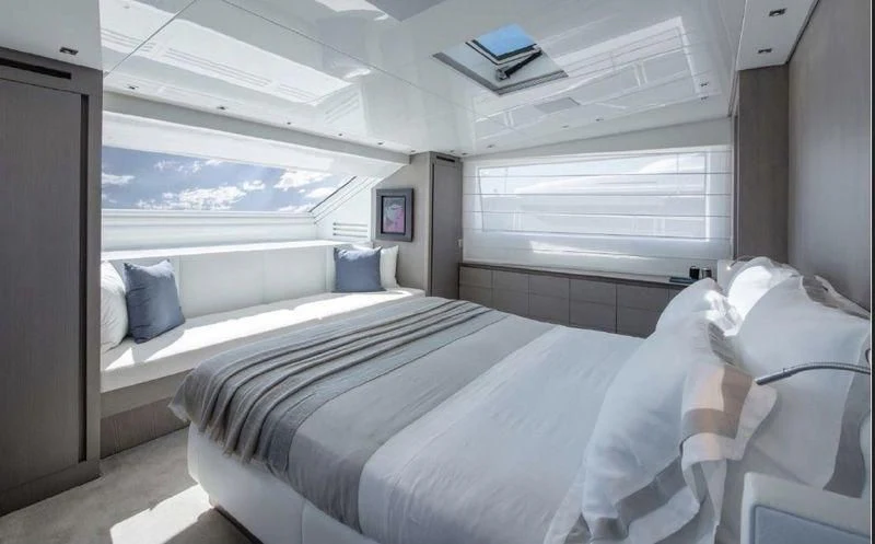 a room with two beds aboard DINAIA Yacht for Charter