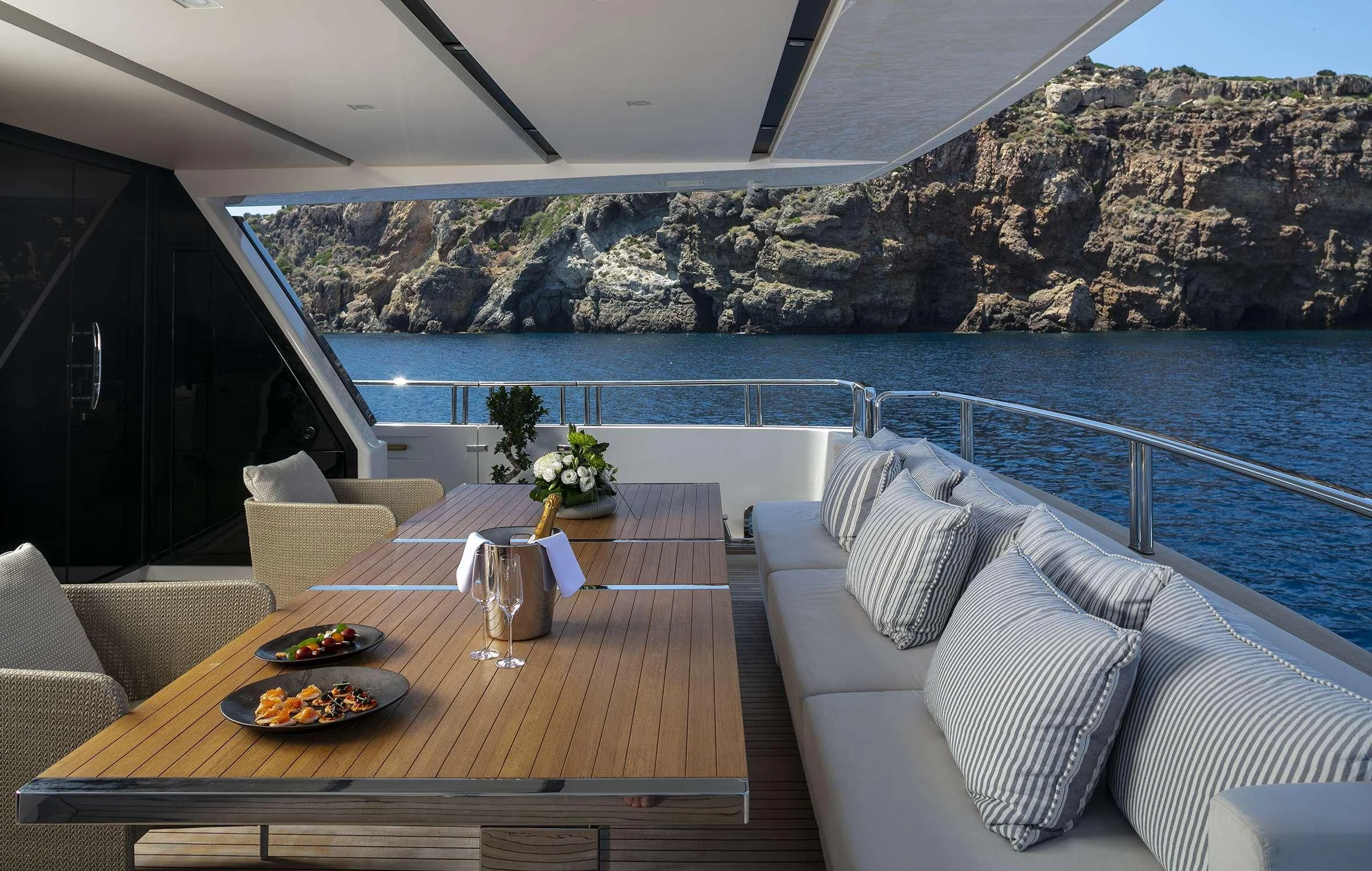 a table with food on it aboard DINAIA Yacht for Charter