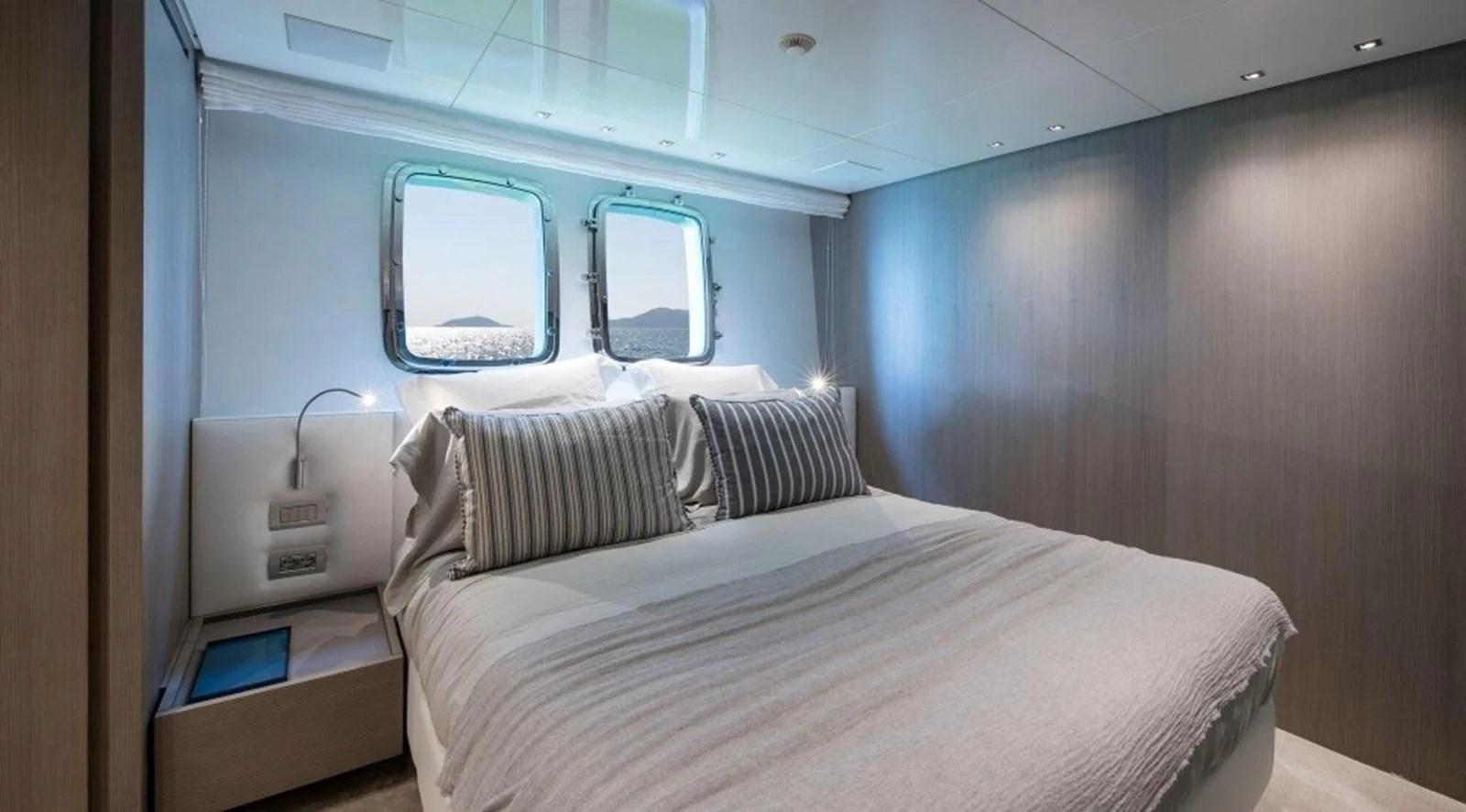 a bed in a room aboard DINAIA Yacht for Charter
