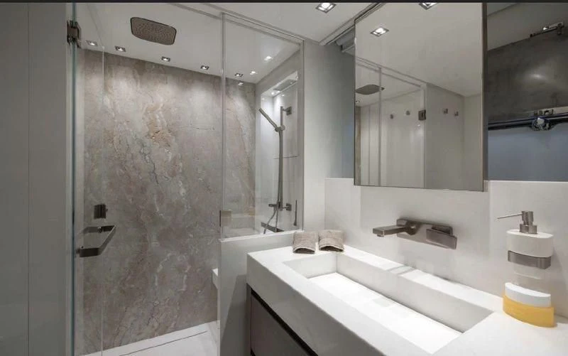 a bathroom with a large shower aboard DINAIA Yacht for Charter