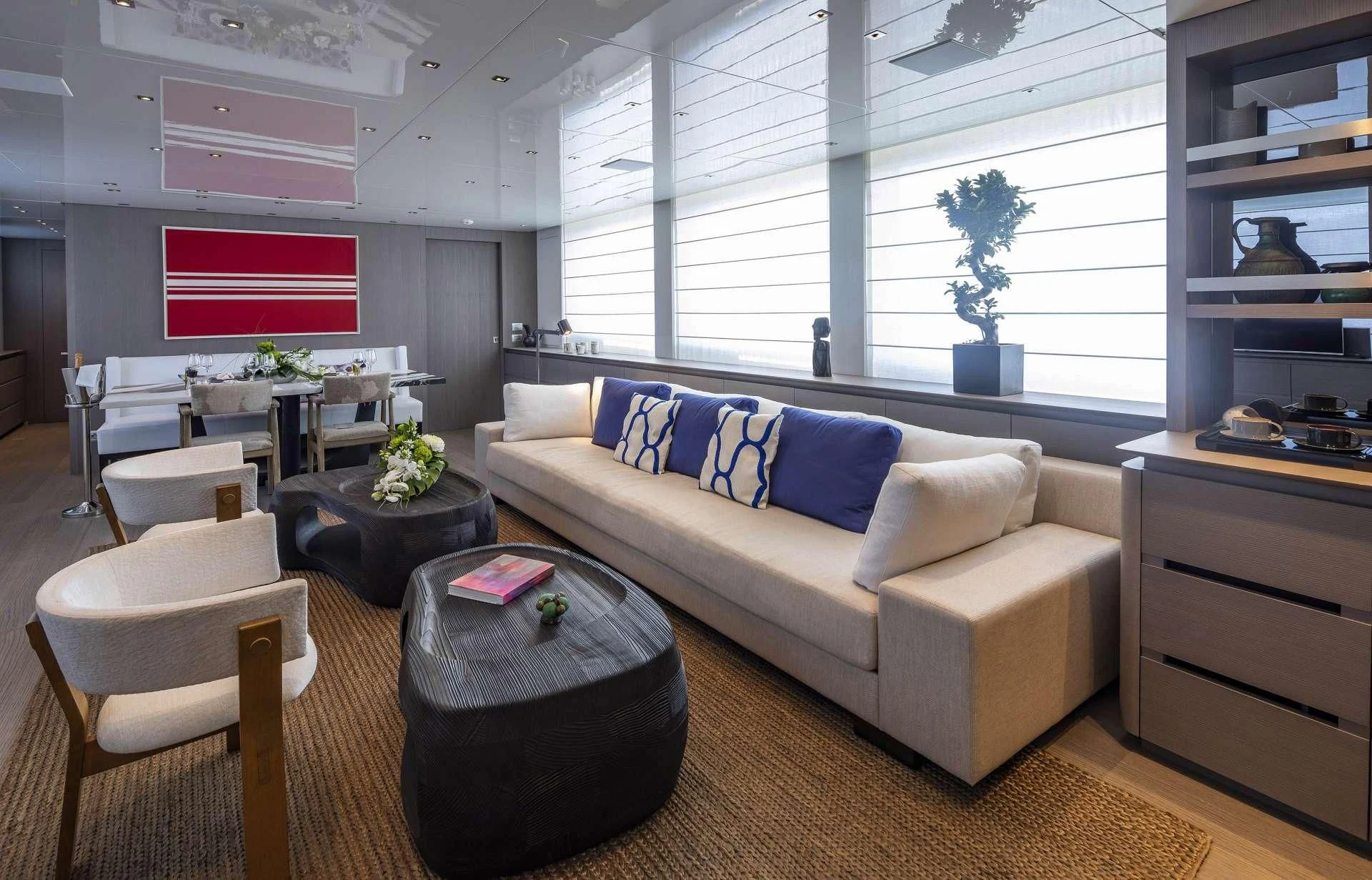 a living room with a couch and a table aboard DINAIA Yacht for Charter