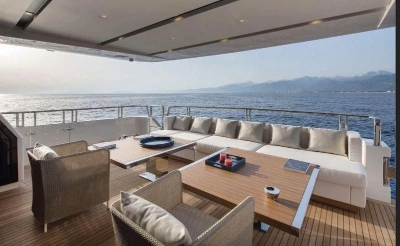 a living room with a large body of water aboard DINAIA Yacht for Charter