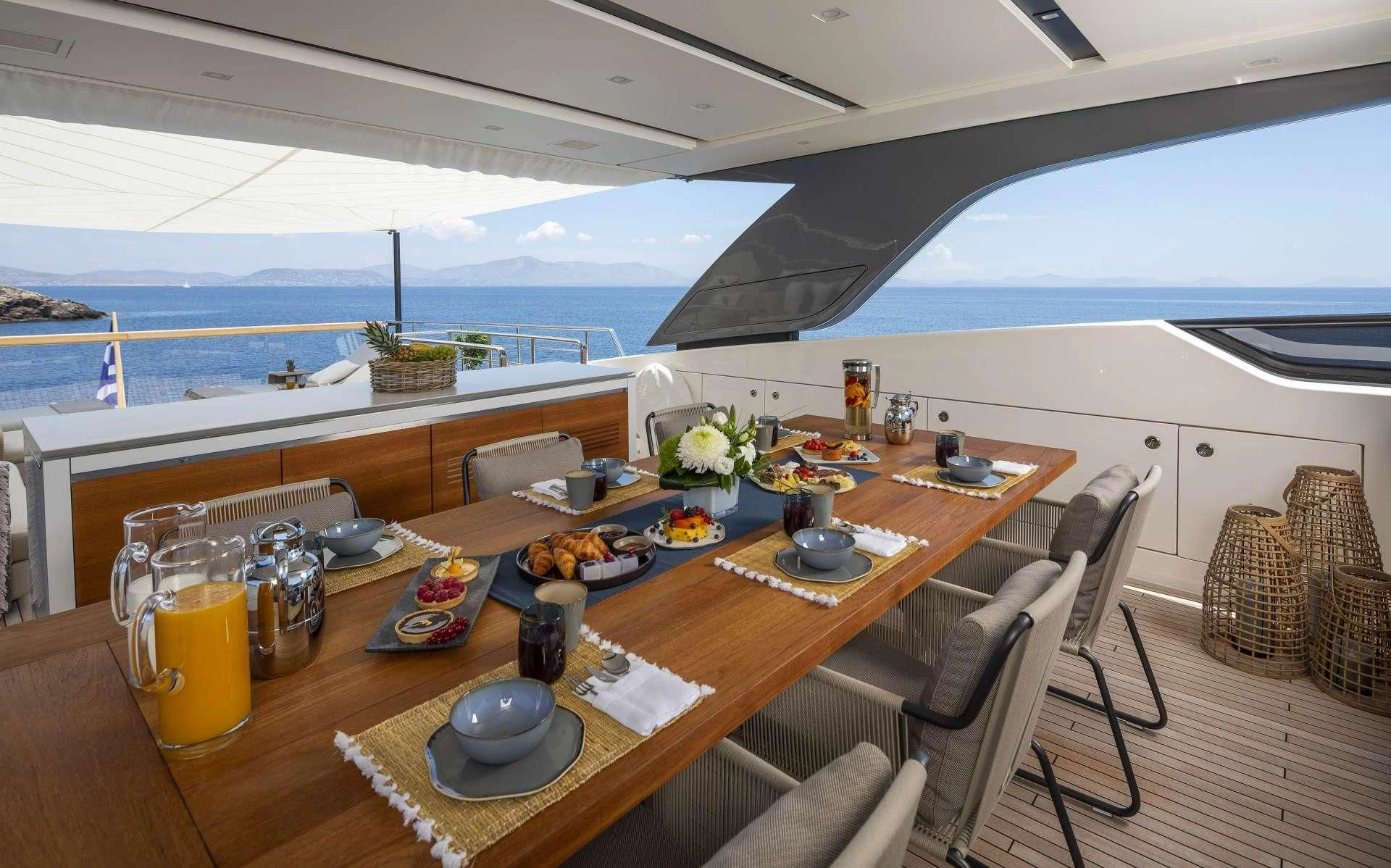 a table with food on it aboard DINAIA Yacht for Charter