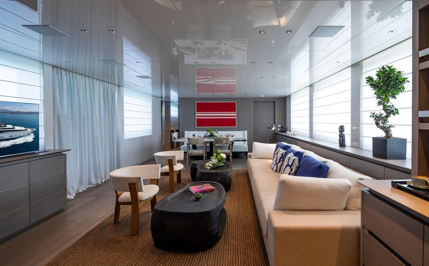a living room with a couch and a table aboard DINAIA Yacht for Charter