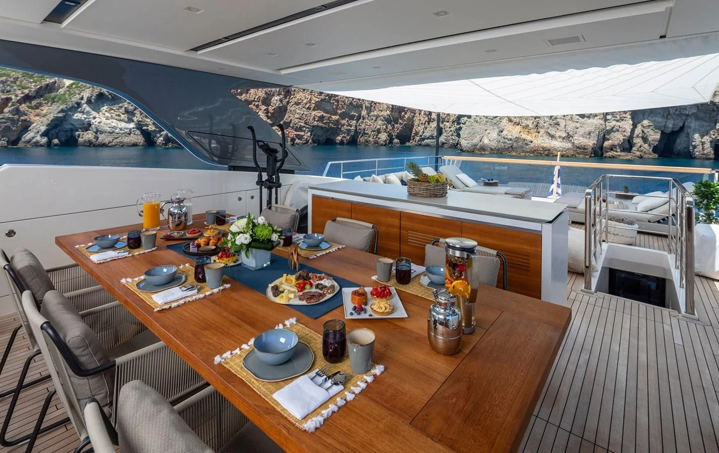 a table with food on it aboard DINAIA Yacht for Charter