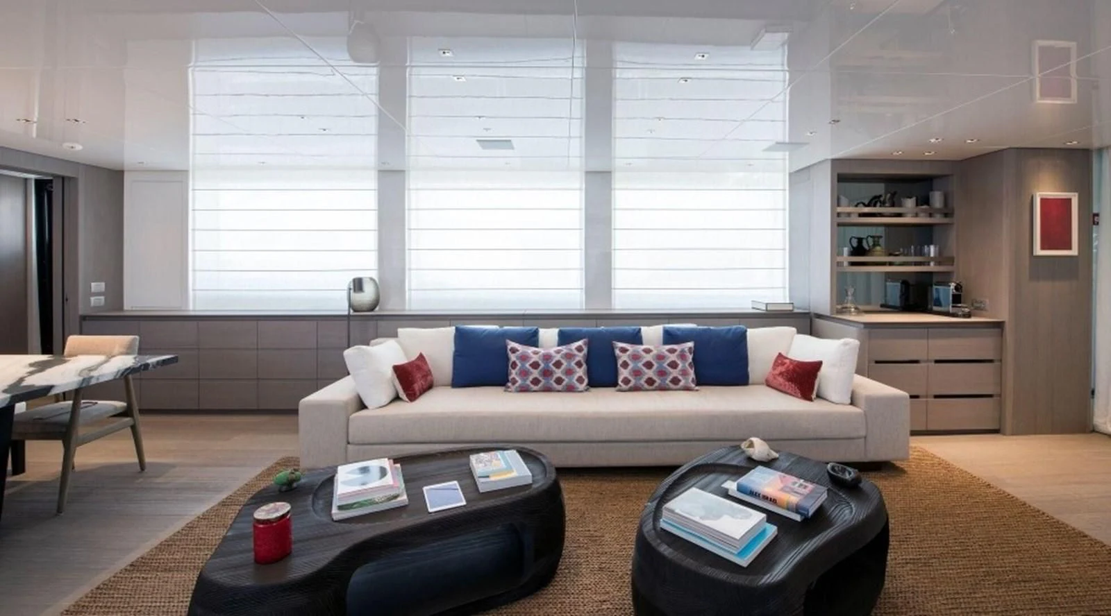 a living room with a couch and a coffee table aboard DINAIA Yacht for Charter
