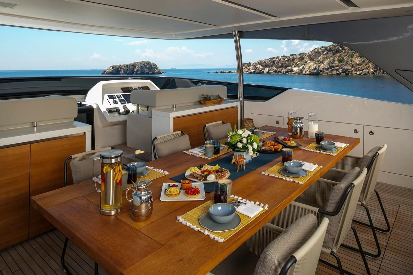 a table with food on it aboard DINAIA Yacht for Charter