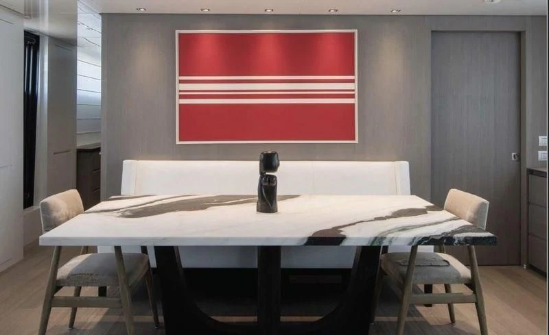 a table with a red and white screen aboard DINAIA Yacht for Charter