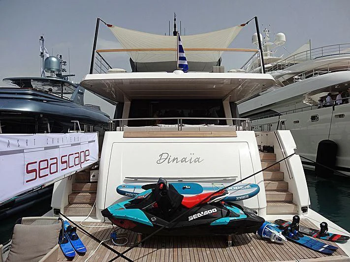 a boat on a dock aboard DINAIA Yacht for Charter