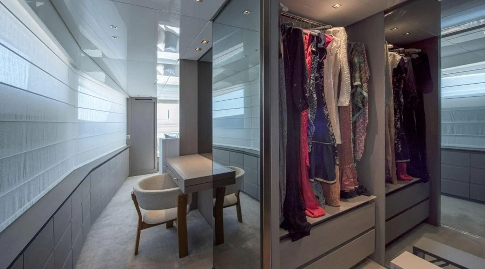 a room with a table and chairs aboard DINAIA Yacht for Charter