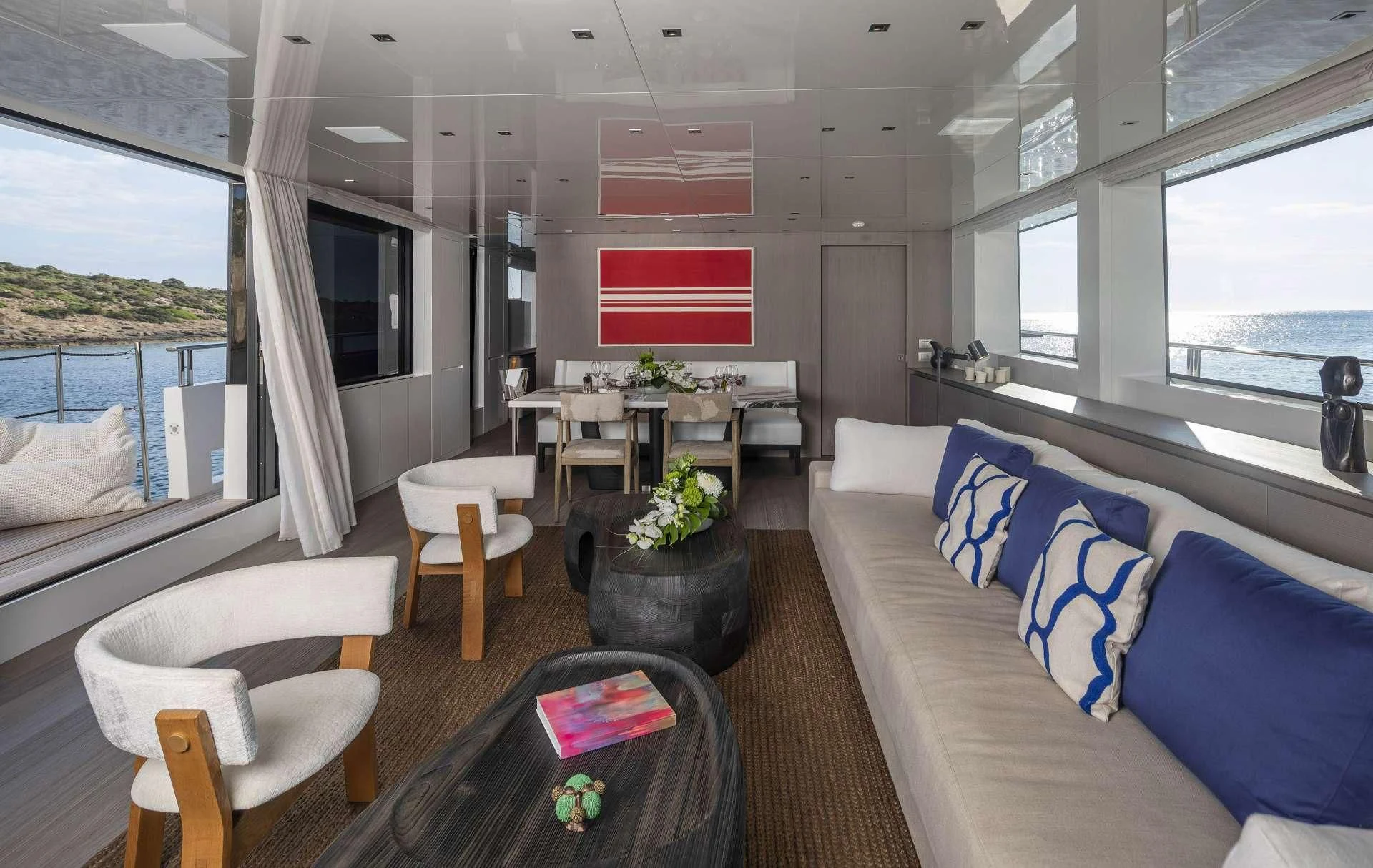 a living room with a couch and a coffee table aboard DINAIA Yacht for Charter