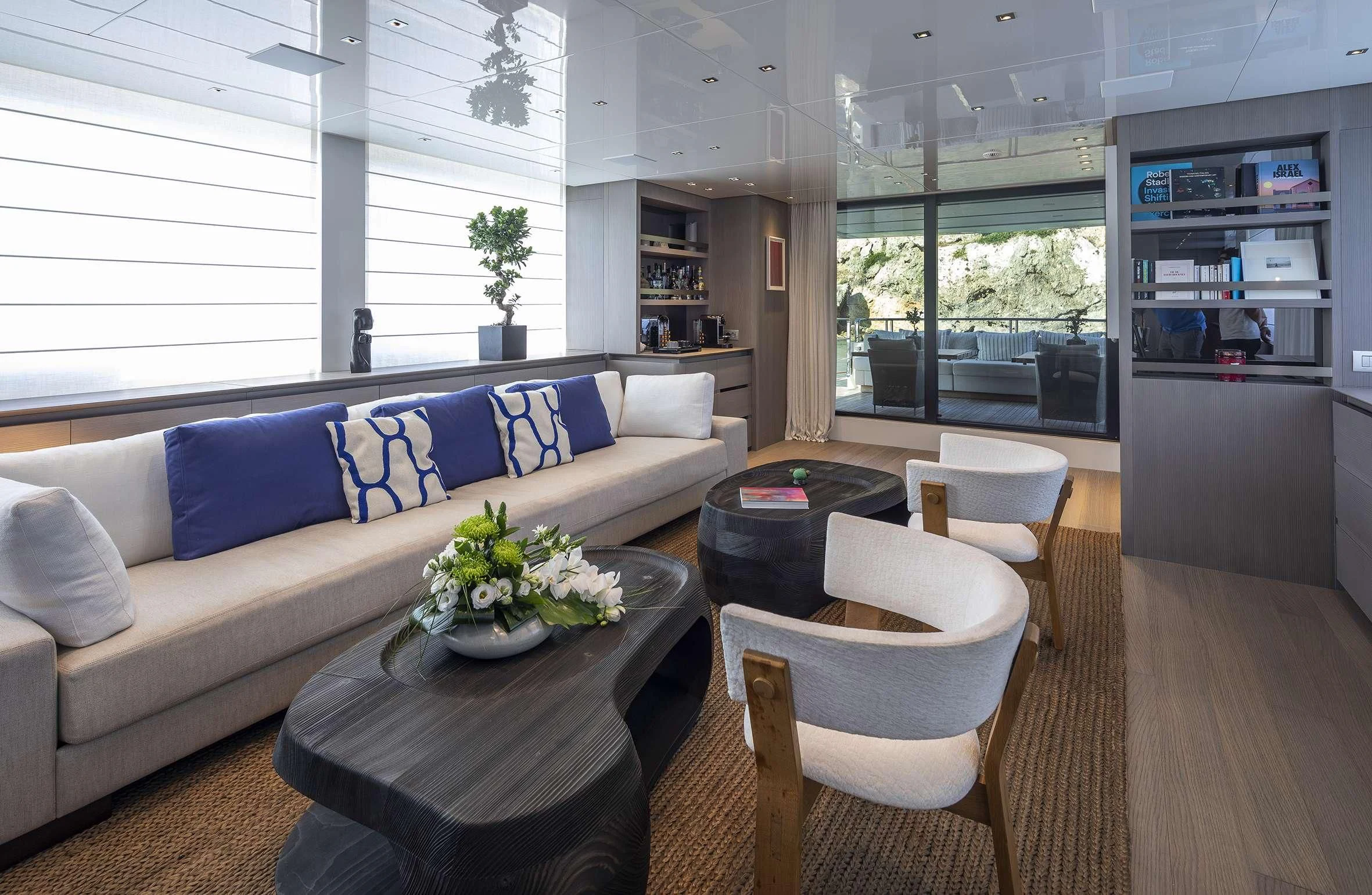 a living room with a couch and a table aboard DINAIA Yacht for Charter