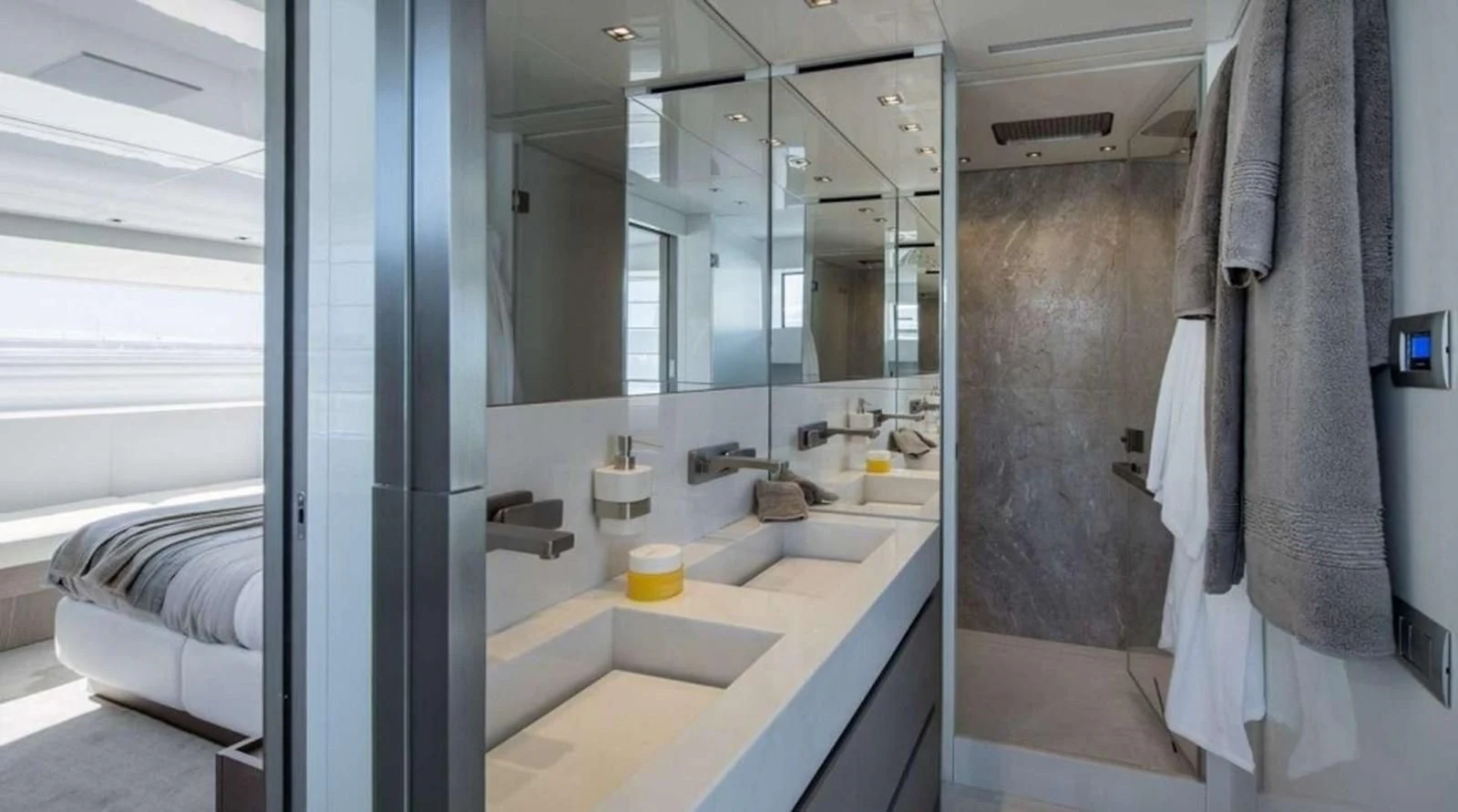 a bathroom with a sink and a mirror aboard DINAIA Yacht for Charter
