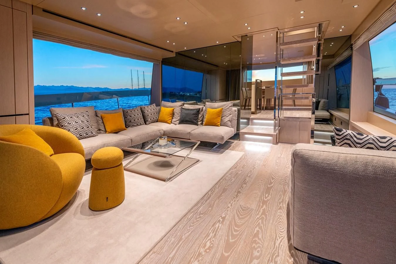 a living room with a large window aboard LOLA Yacht for Sale