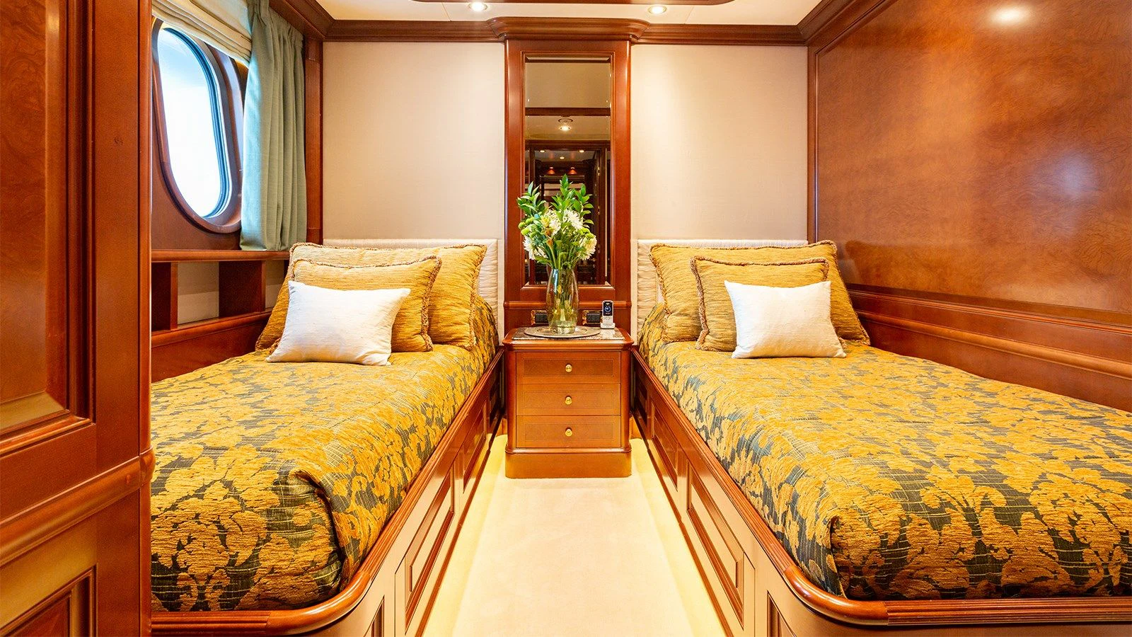 a room with two beds aboard INCAL Yacht for Sale