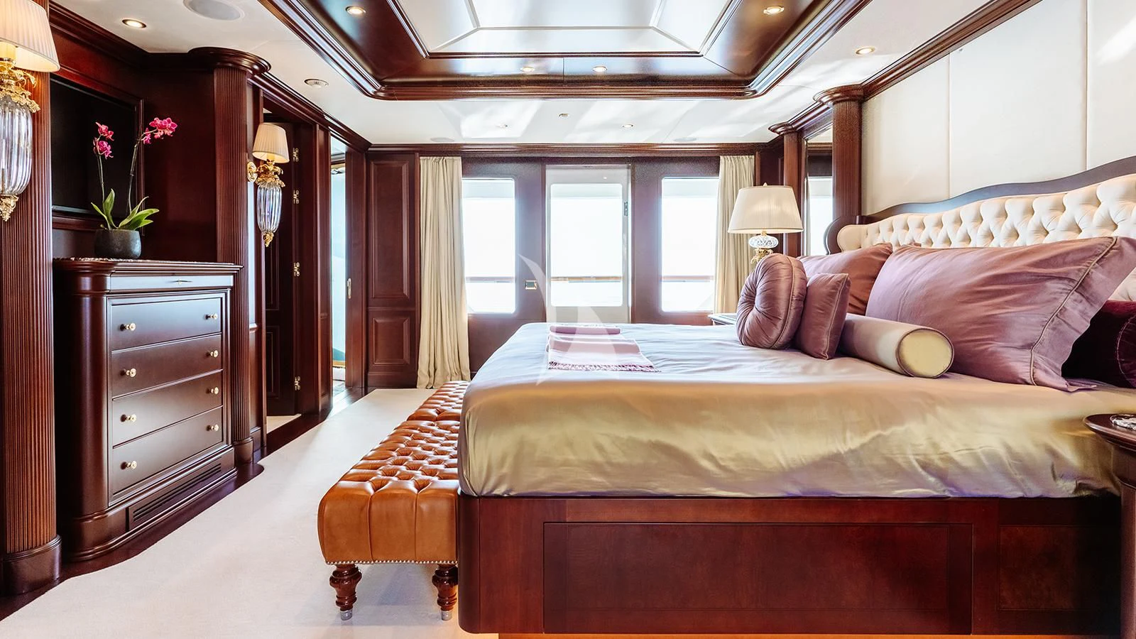a large bed in a room aboard INCAL Yacht for Sale