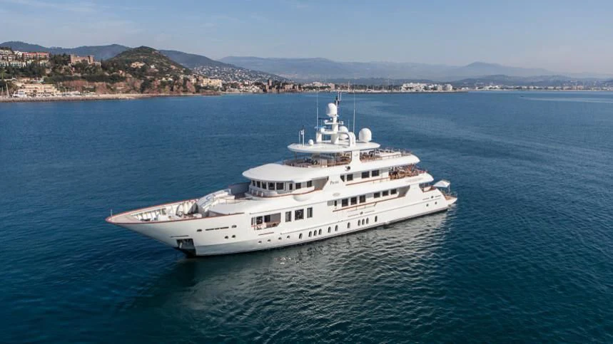 a white yacht in the water aboard INCAL Yacht for Sale