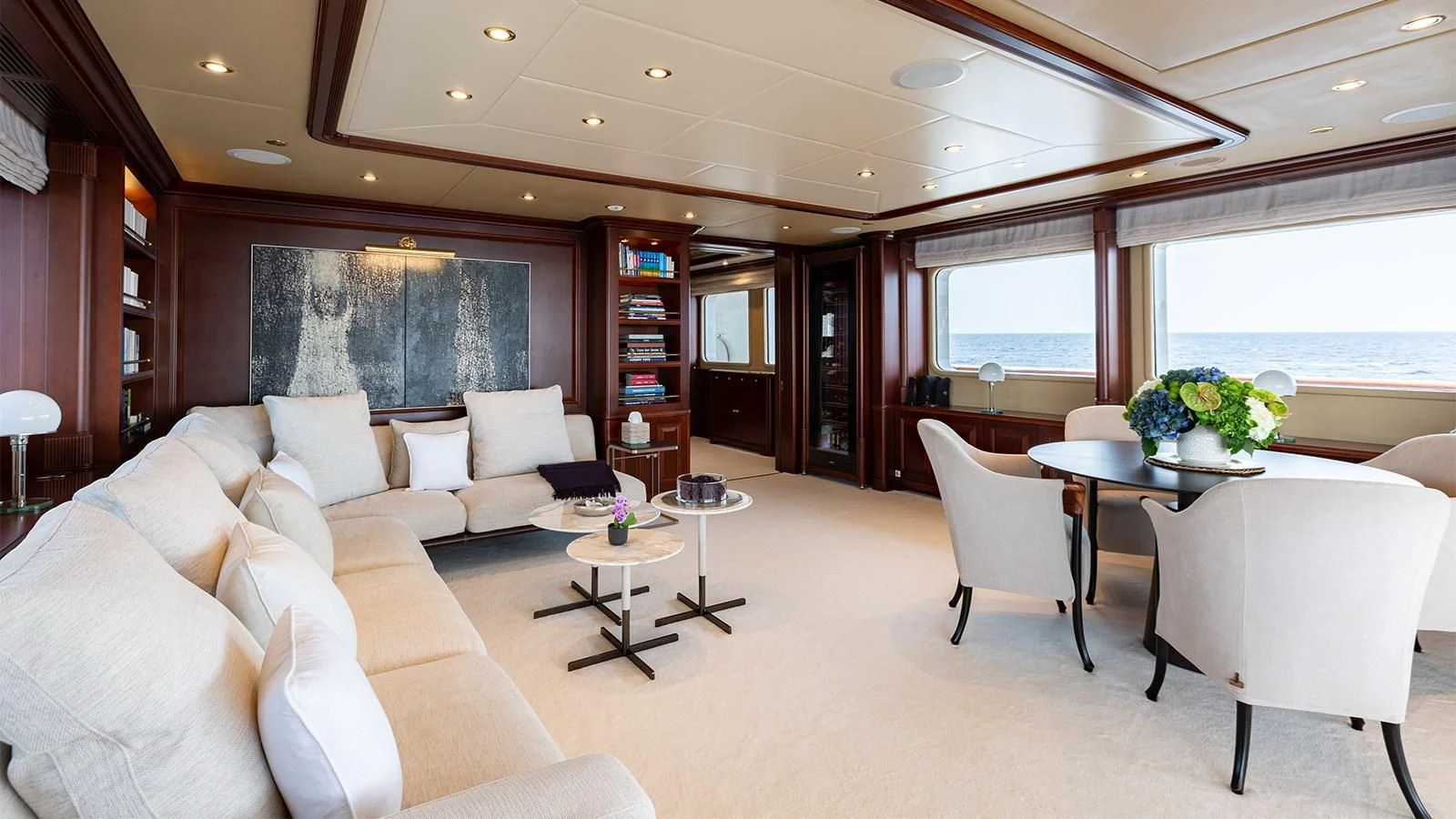 a living room with a couch and a table aboard INCAL Yacht for Sale