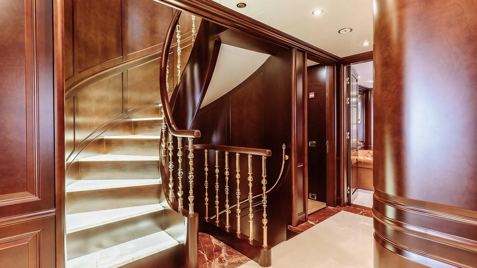 a staircase in a building aboard INCAL Yacht for Sale