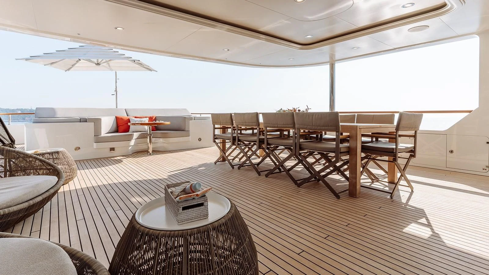 a room with a table and chairs aboard INCAL Yacht for Sale