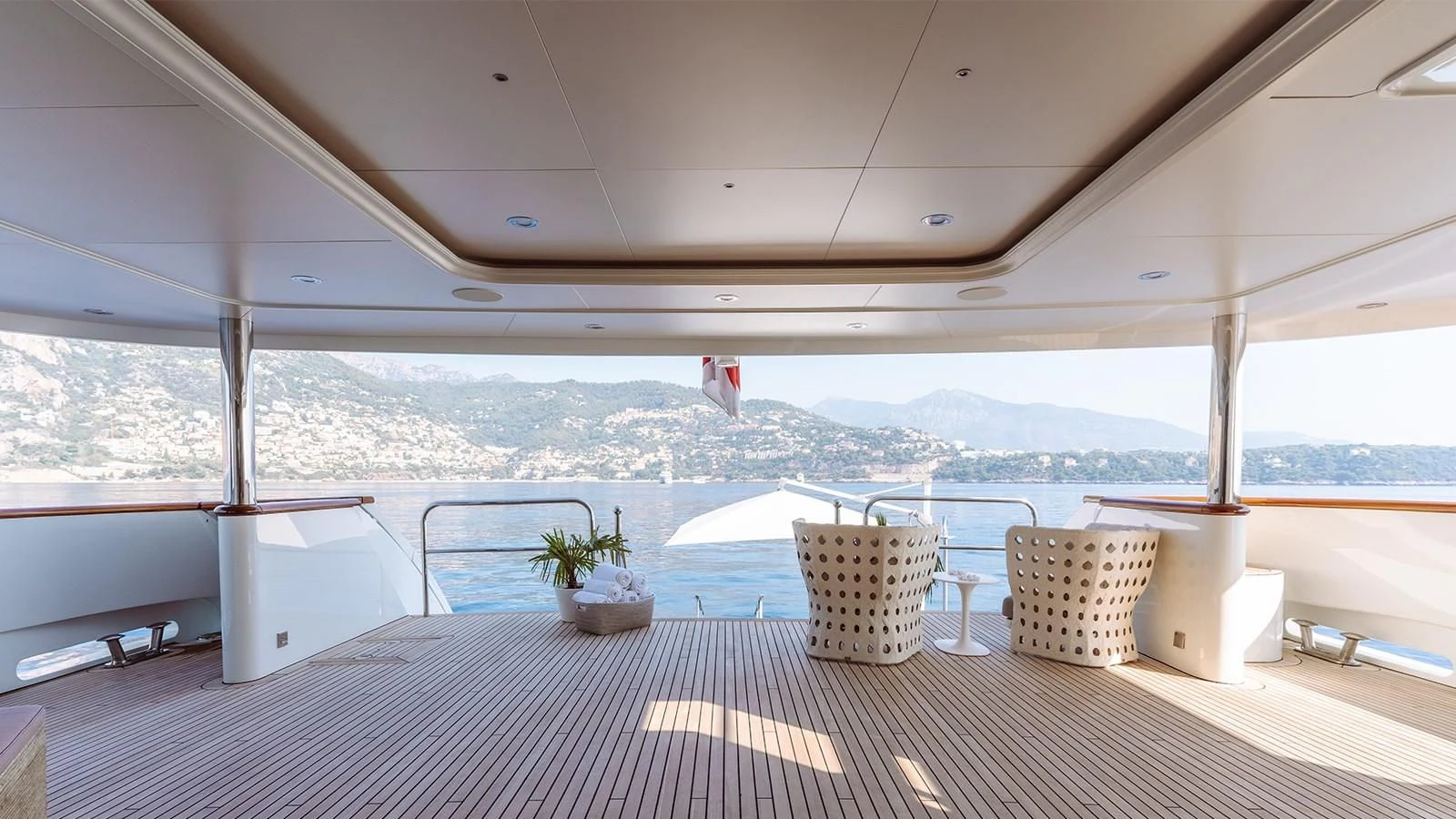 a room with a table and chairs aboard INCAL Yacht for Sale