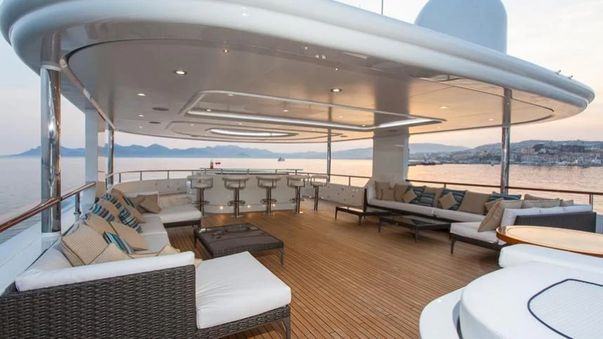 a large room with a view of the ocean and the land below aboard INCAL Yacht for Sale