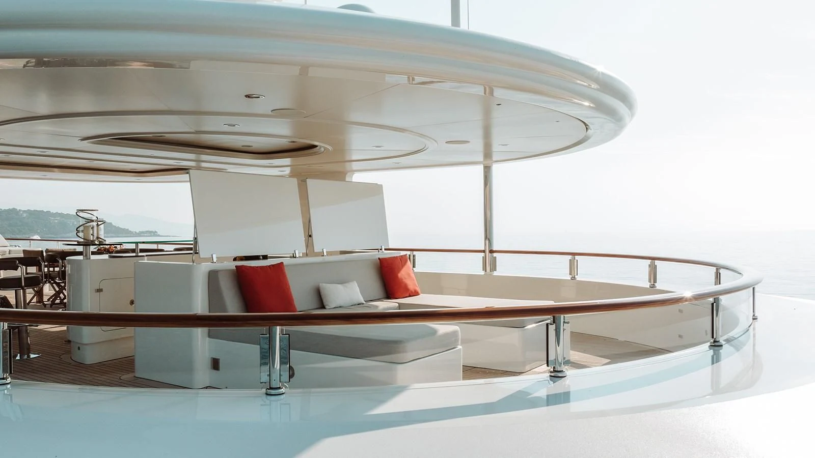 a white lounge chair in a room aboard INCAL Yacht for Sale