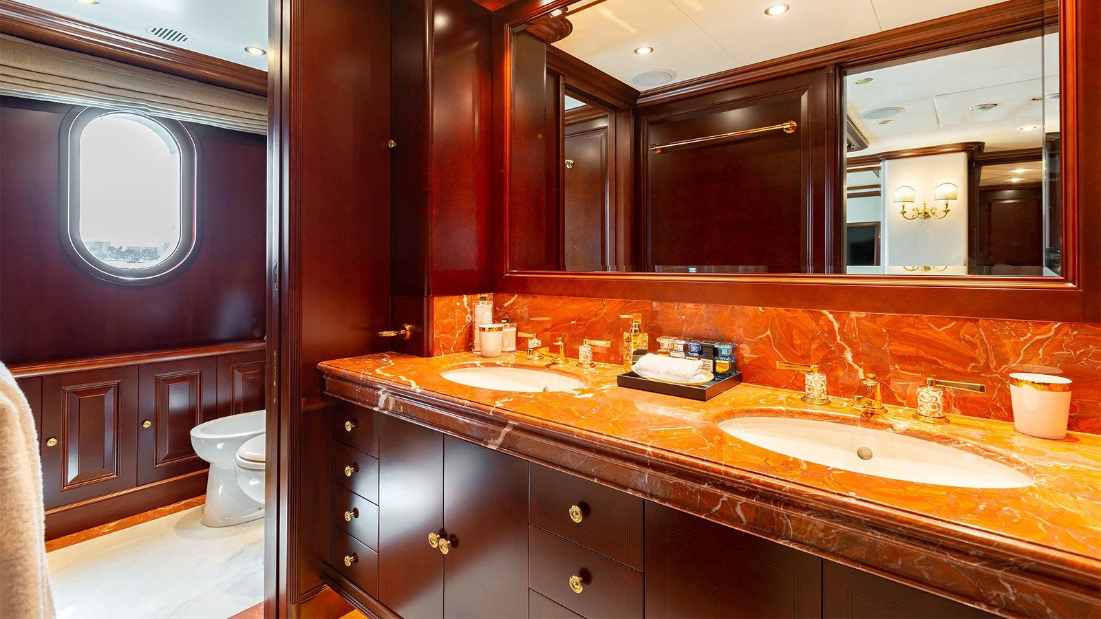 a bathroom with a large mirror aboard INCAL Yacht for Sale
