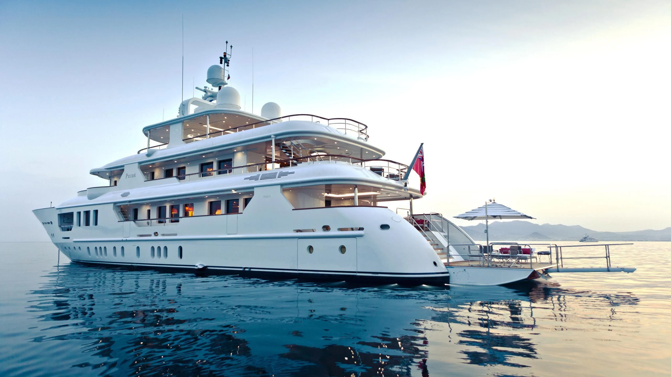a large white boat in the water aboard INCAL Yacht for Sale