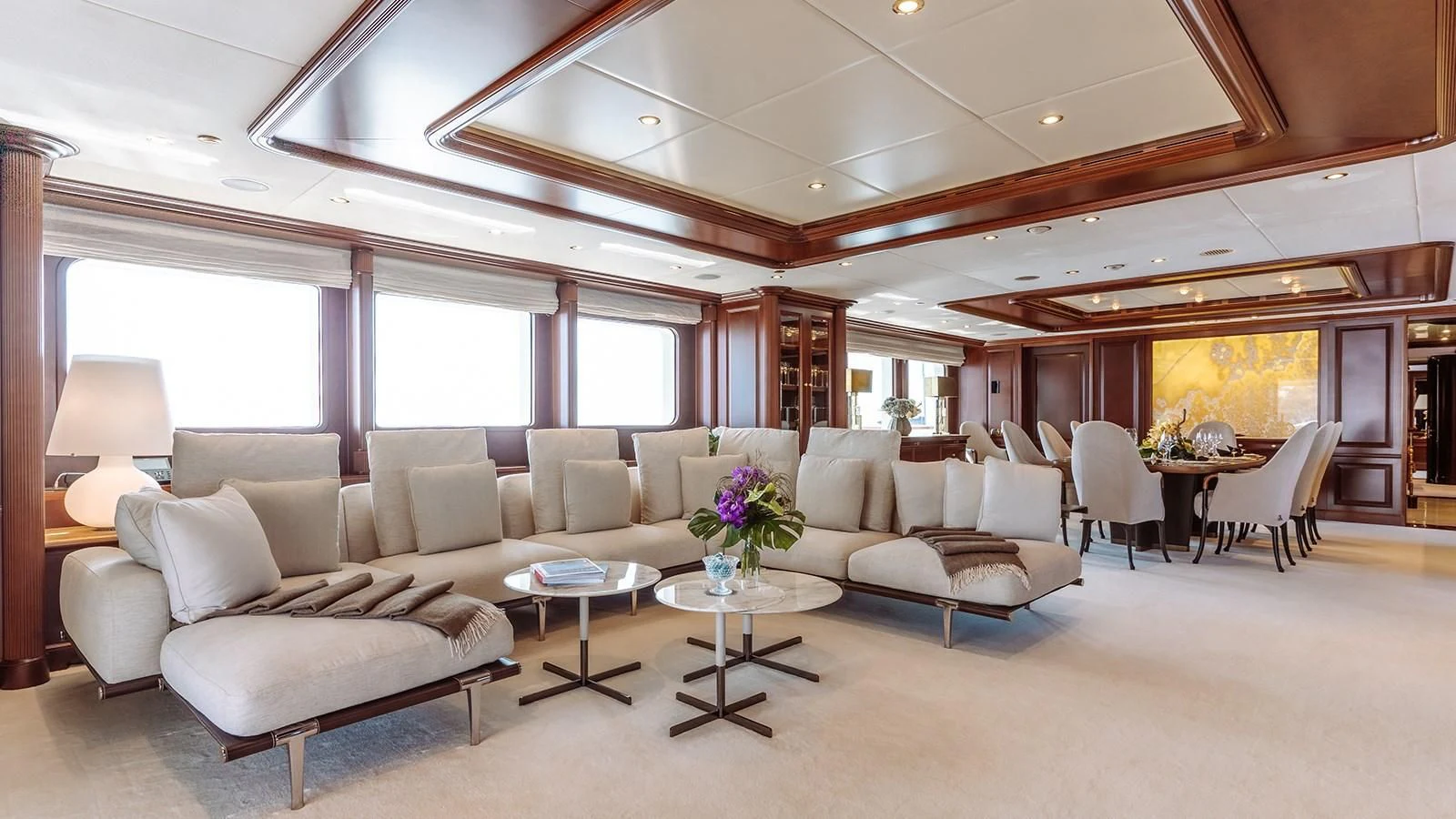 a living room with a couch and a table aboard INCAL Yacht for Sale