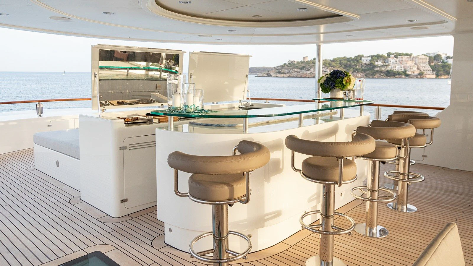 a room with a table and chairs aboard INCAL Yacht for Sale