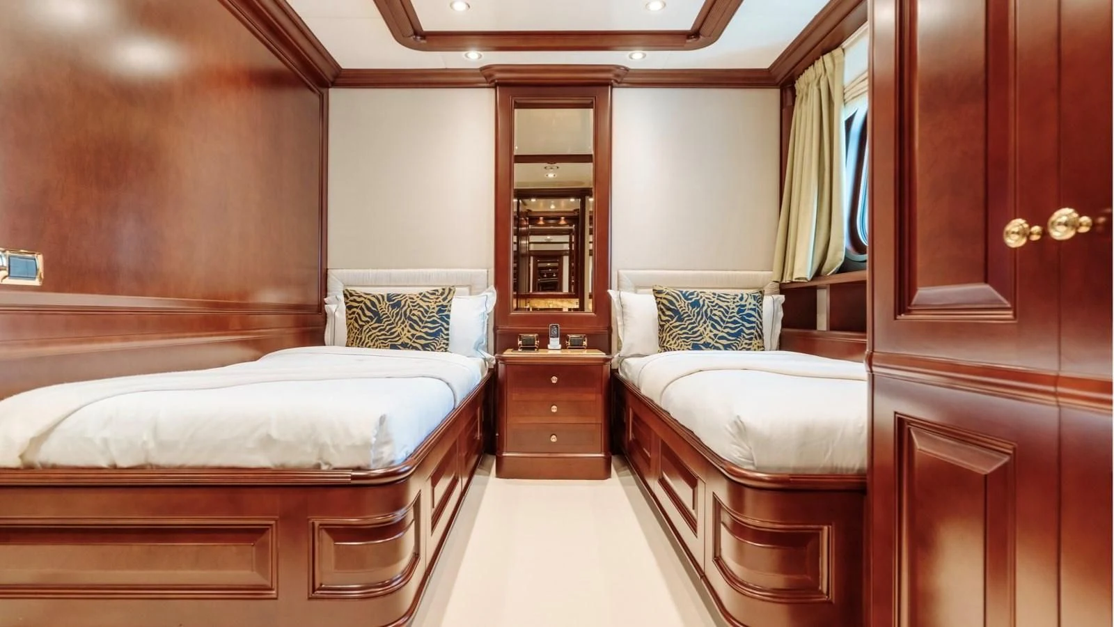 a room with two beds aboard INCAL Yacht for Sale
