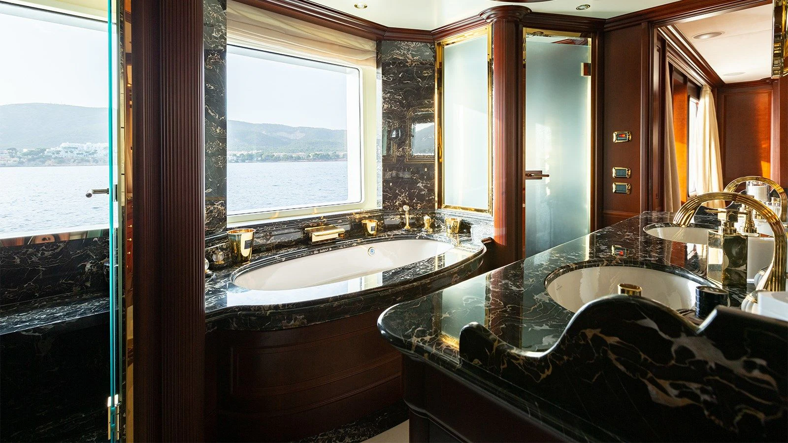 a large bathroom with a large tub aboard INCAL Yacht for Sale