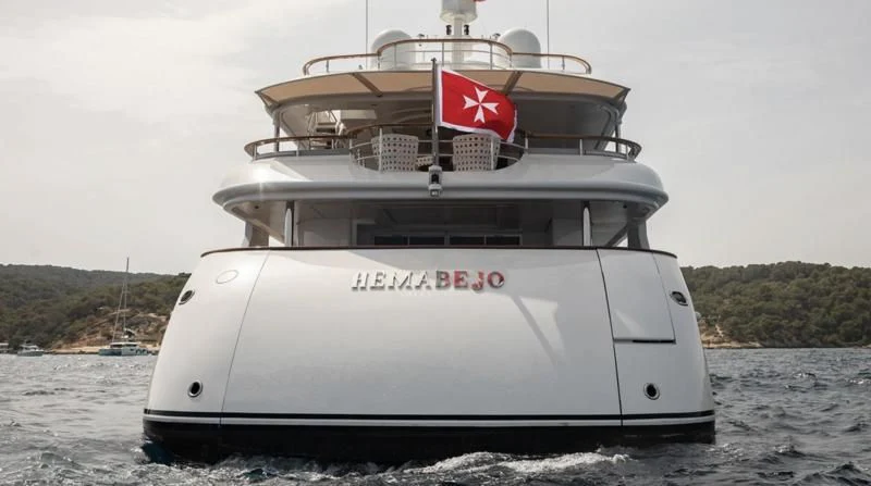 a large white ship aboard INCAL Yacht for Sale