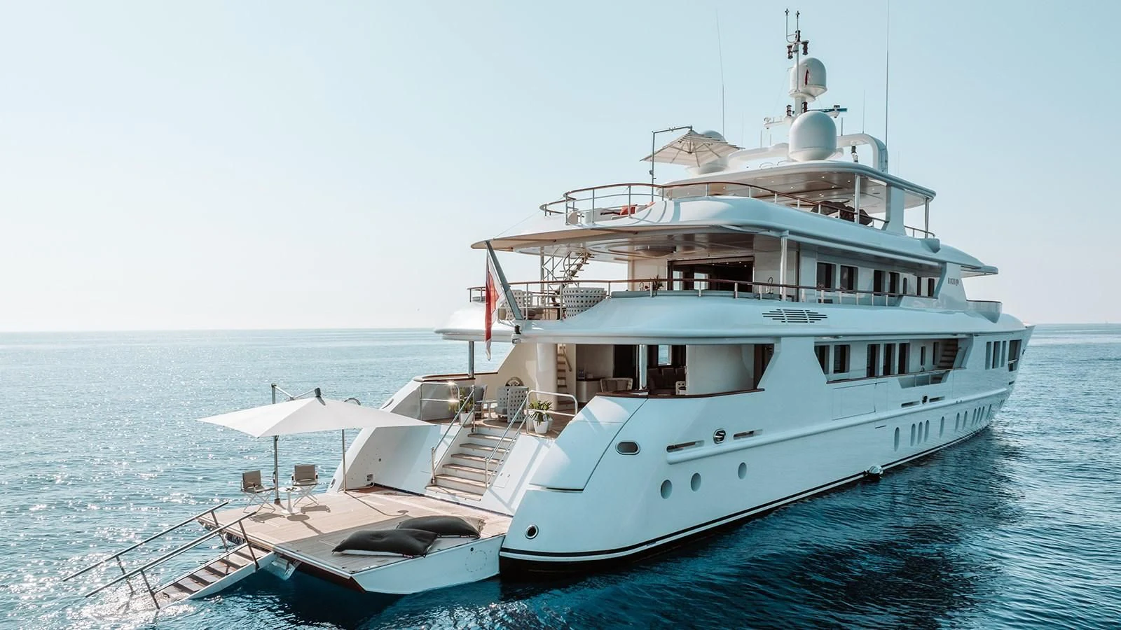a large white boat in the water aboard INCAL Yacht for Sale